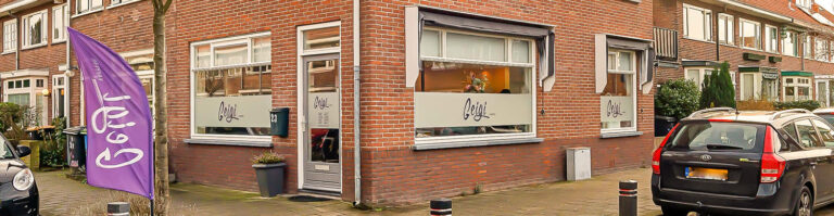 De gevel van Geigi Kappers aan de Kerkerinklaan